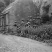 View of Inverclyde House, Cove, from driveway of staircase leading to doorway.