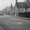 General view of High Street, Dunblane from south east showing Balhaldie House and St Blane's Church.