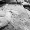 Oblique aerial view centred on the remains of farmstead and rig, taken from the NNE.