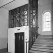 Interior. View of lift shaft and stairwell.