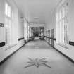 Interior. View of sample corridor with glazed partioning.