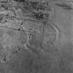 Oblique aerial view centred on the remains of part of the fort and settlement, Black Hill, Lesmahagow.