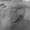 Oblique aerial view centred on the remains of Down Law fort.