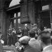 A O Curle with King George V and Queen Mary leaving Royal Scottish Museum, Chambers Street.