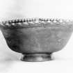 Traprain treasure - "a triangular dish".From a photograph album of the Curle family, 1911-19.