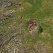 Oblique aerial view of Traprain Law fort centred on summit excavations undertaken in July 1997, taken from the NE.