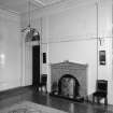 Interior view of Cairness House showing entrance hall with fireplace.
