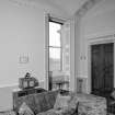 Interior view of Cairness House showing room to right of entrance hall.

