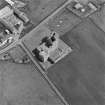 Oblique aerial view centred on the ruins of Noltland Castle, Westray.