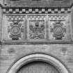 Detail of armorial panels above entrance arch to Duntreath Castle.