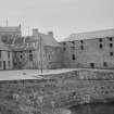 General view of buildings in Shorehead harbour, Portsoy, including Corf Warehouse.
