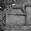 View of gravestone to Helen Johnstown and James Meggat dated 1694 in the churchyard of Glencorse Old Parish Church.