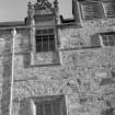 Detail of carved pediment, N elevation of courtyard, Cullen House.