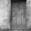 Detail of door on SE side of Ballindalloch Castle dovecot with panel inscribed 'B 1696'.