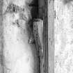 Thatched house, detail of wooden door hinge