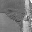 Oblique aerial view of the possible broch at Knowe of Hunclett, Rousay.