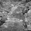 Excavation photograph showing area N9 with fallen roof timbers

