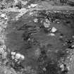 Excavation photograph showing area N9 with fallen roof timbers

