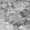 Excavation photographs showing details of wall sectioning in area OP8

