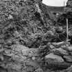 Excavation photographs showing details of wall sectioning in area OP8

