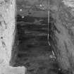 Excavation photograph : trench and surface area, looking east.