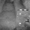 Excavation photograph : trench looking west.