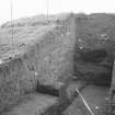 Excavation photograph : north and east baulks, looking north-east.