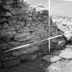 Excavation photograph showing Guardhouse, inner wall
