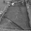 Edinburgh Castle, settlement. Excavation photograph showing area H (north) - gravel/pebbly surface occupying N quarter of trench.