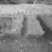 Edinburgh Castle, settlement. Excavation photograph showing area H - linear features, longitudinally half sectioned.