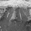 Edinburgh Castle, settlement. Excavation photograph showing area H - 'beam slots' fully excavated.