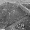 Edinburgh Castle, settlement. Excavation photograph showing area H - general view of surface below cobbles 270.