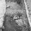 Edinburgh Castle, settlement. Excavation photograph showing area H - N part of area below wall construction after removal of stoney layer 268.