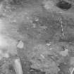 Edinburgh Castle, settlement. Excavation photograph showing area H - burnt spread beneath 295, with 305 green clay beneath it.