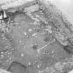 Edinburgh Castle, settlement. Excavation photograph showing area H - excavated post holes cutting 305.