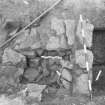 Edinburgh Castle, settlement. Excavation photograph showing area H - fully excavated base of 296 furnace.