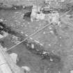 Edinburgh Castle, settlement. Excavation photograph showing area H - excavated base and section of 333.