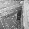 Edinburgh Castle, settlement. Excavation photograph: area H - looking south, along slot.