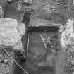 Edinburgh Castle, settlement. Excavation photograph: area H - general view along complete trench with 409 sticky clay layer in foreground.