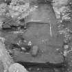 Edinburgh Castle, settlement. Excavation photograph: area H - half sectioned red clay floor 366 revealing 432 cut.