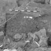 Edinburgh Castle, settlement. Excavation photograph: area H - further excavation/half sectioning of furnace 296.