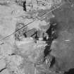 Edinburgh Castle, settlement. Excavation photograph: area H - general shot of rock cut pit 438 to W of furnace 296, with 432 architectural stonework in lower fill.