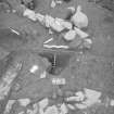 Edinburgh Castle, settlement. Excavation photograph: area H - posthole 462 half excavated with related feature 442 in background.