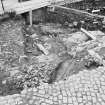 Edinburgh Castle, settlement. Excavation photograph : area H - after further cleaning of cobbles, 270 etc.