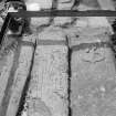 View of gravestones commemorating Robert McGregor 1734 (centre), his wife undated (left) and his sons 1735 and 1750 (right), in the churchyard of Balquhidder Old Parish Church.