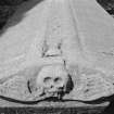 Detail of coped gravestone for Isobell Gibson dated 1640, in the churchyard of St Adrian's Parish Church, Anstruther Easter.Anstruther Easter Parish Church.