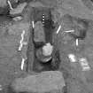 Edinburgh Castle. Excavation photograph : area H - detail of FE box and stones within.