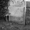 View of gravestone for Henry Oswald dated 1791, in the churchyard of Collessie Parish Church.