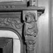 Library, detail carved figure on fireplace