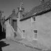 View of 7 Castle Street and corner of Wightman's Wynd, Anstruther Easter, from SW.